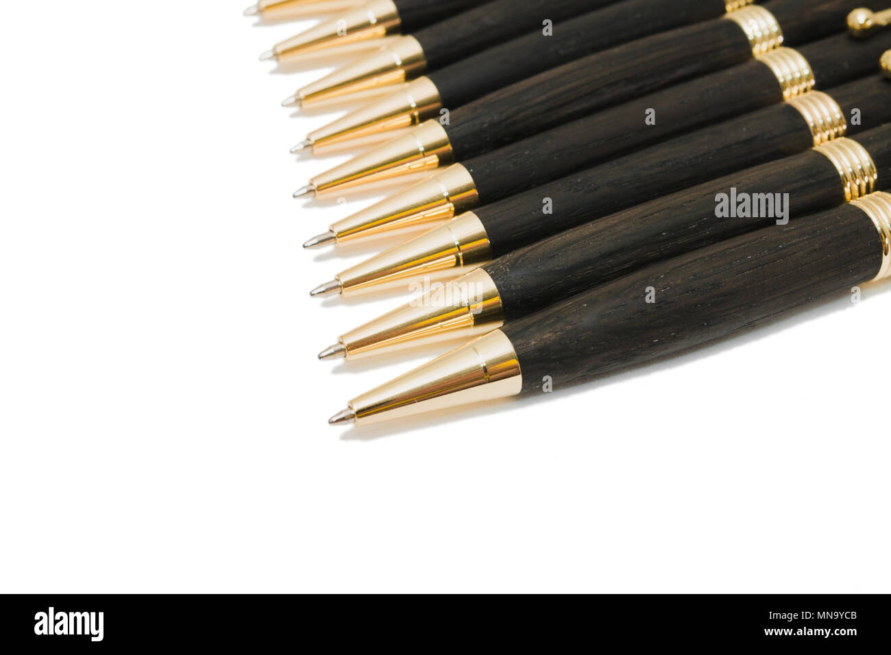 Ballpoint pen made of wood and metal on a white background Stock Photo