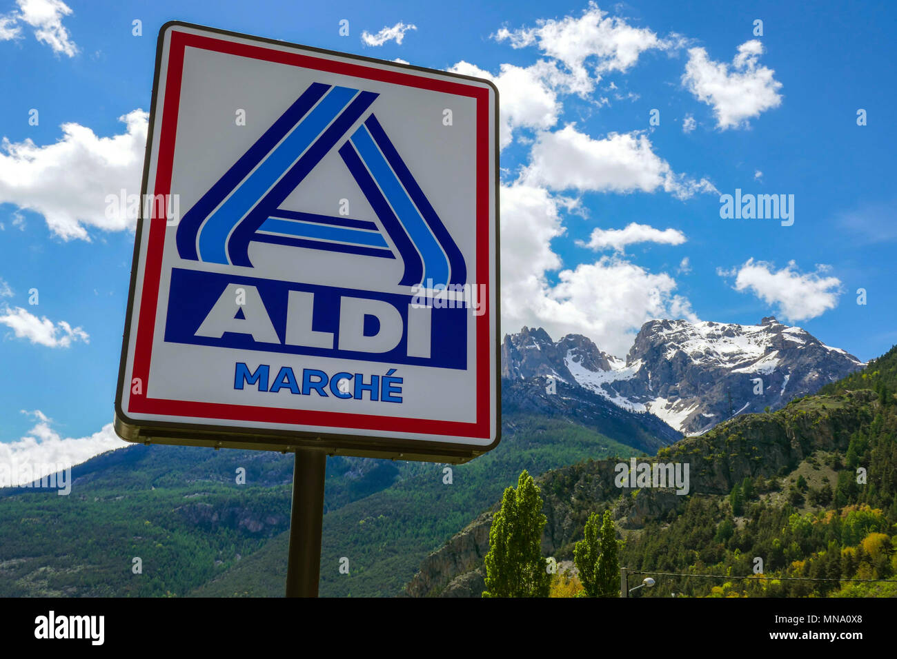 Aldi Marche sign against blue sky, Briancon, France Stock Photo