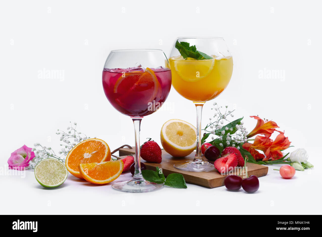 Two wine glasses with summer fruit and berry cocktails Stock Photo Alamy