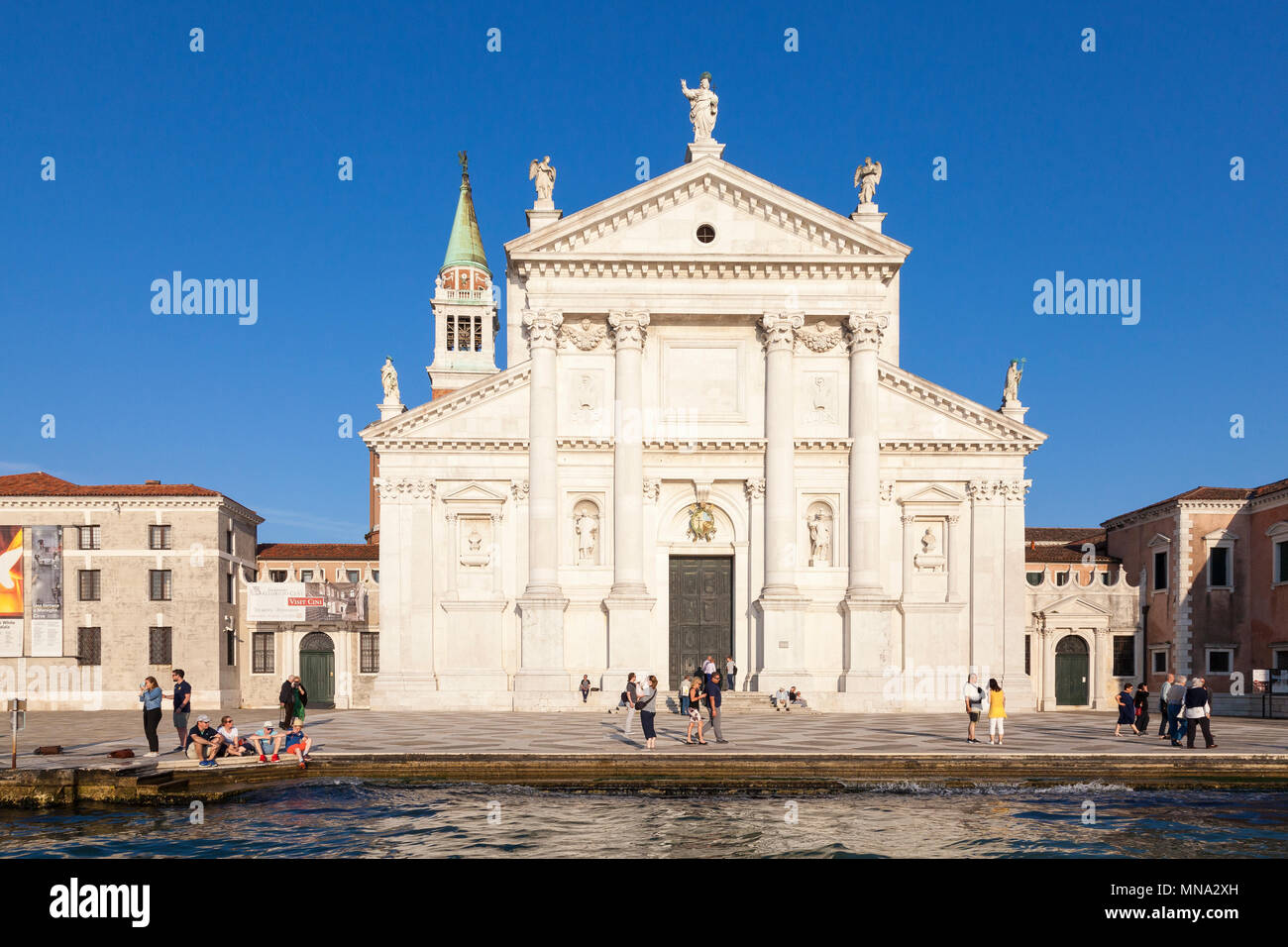 The Benedictine church of San Giorgio Maggiore on Isola San Giorgio Maggiore, at sunset, Venice, Veneto, Italy, 16thC Renaissance marble by Andrea Pal Stock Photo