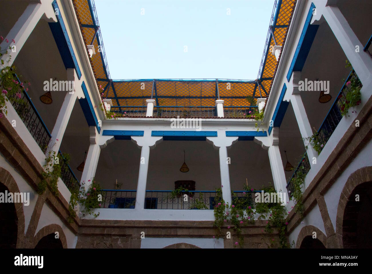 Looking up at the top floor of a Moroccan Riad in Essaouira Stock Photo