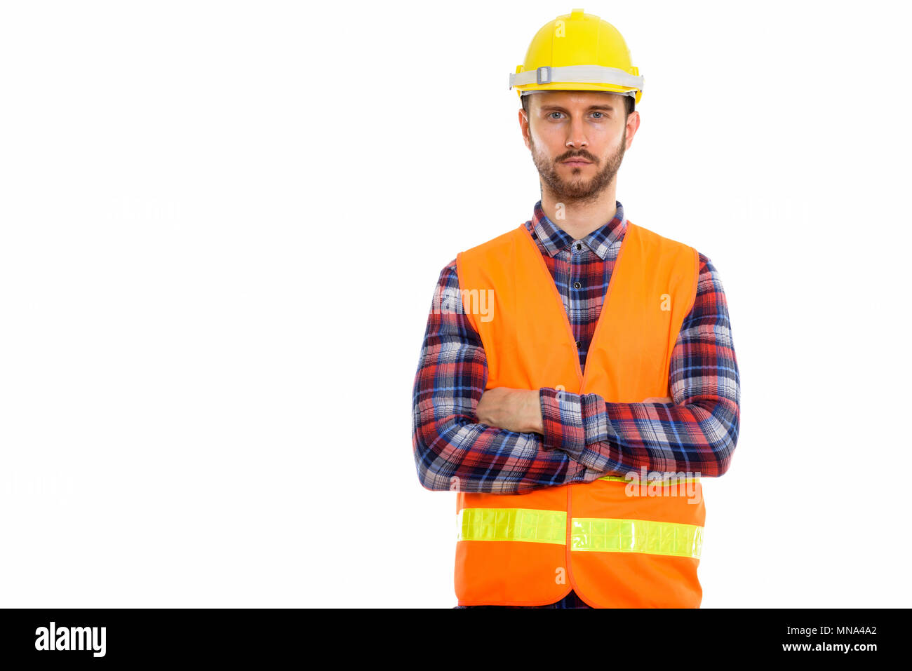 Young handsome bearded man construction worker Stock Photo