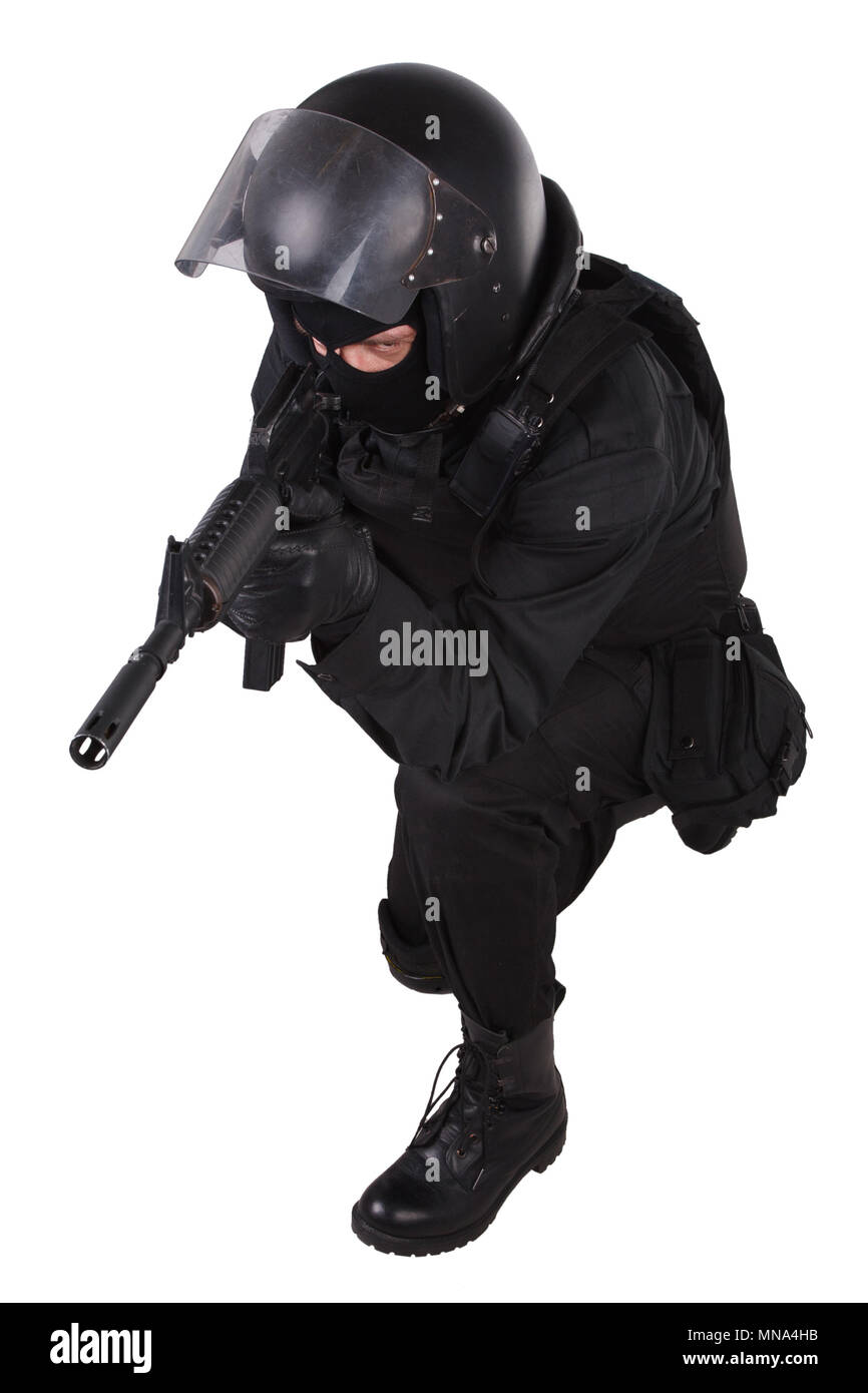 Riot police officer in black uniform isolated on white Stock Photo