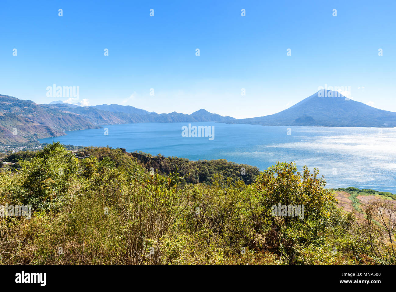 Panorama view to the lake Atitlan and volcanos - Guatemala Stock Photo