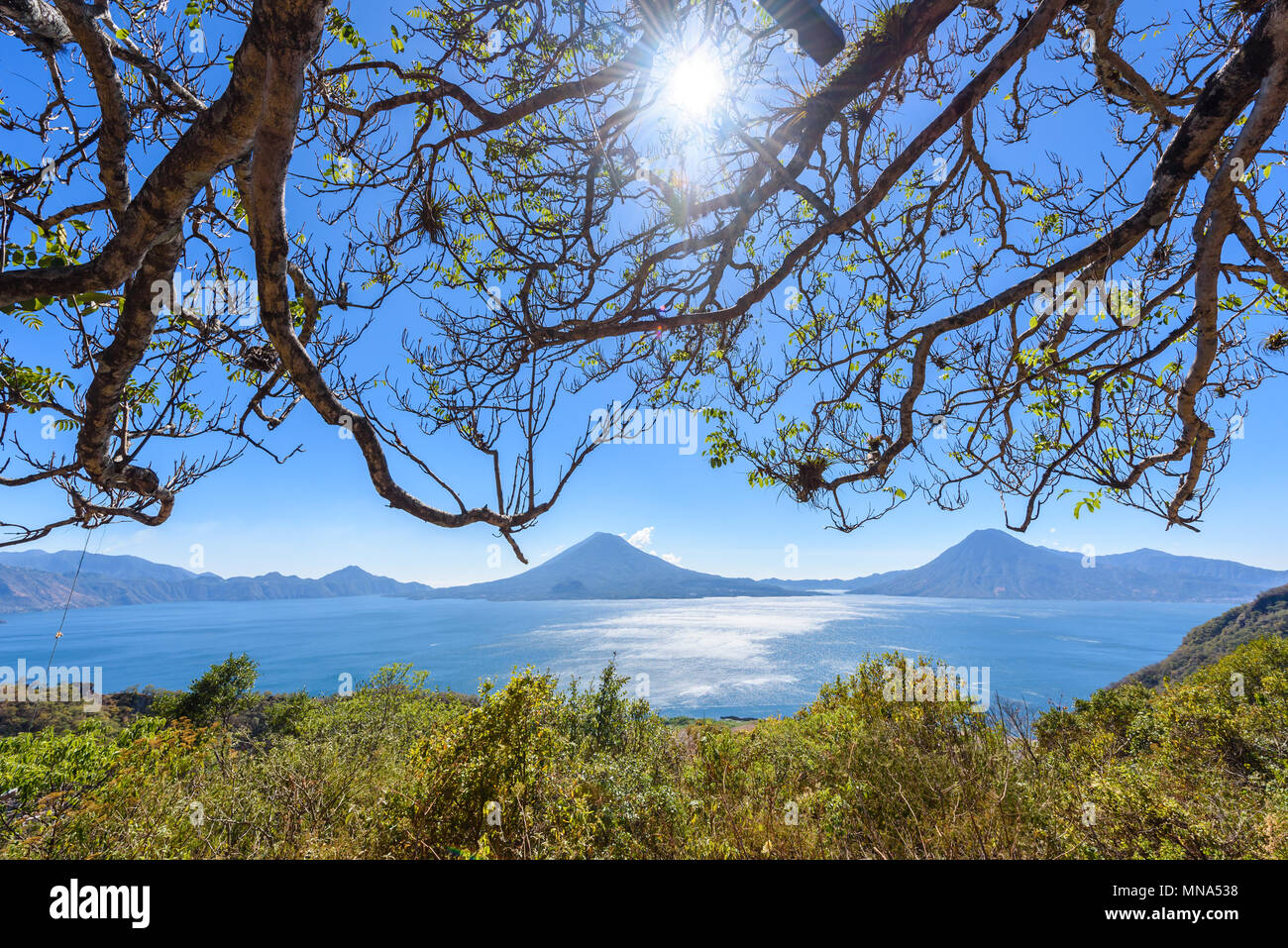 Panorama view to the lake Atitlan and volcanos - Guatemala Stock Photo