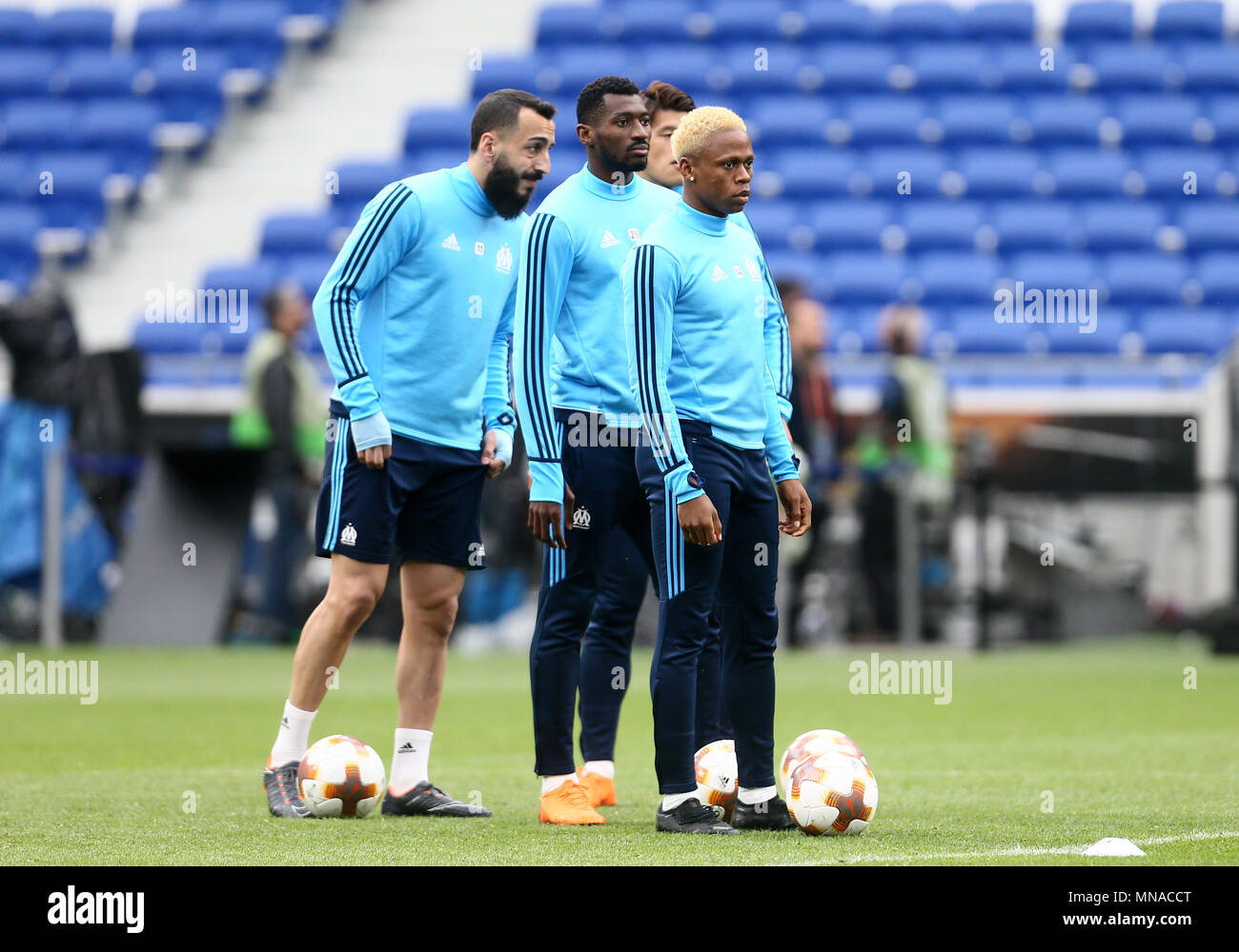 Clinton N'Jie of Marseille with Andre-Frank Zambo Anguissa of Marseille and Kostas Mitroglou of Marseille during a Marseille training session, prior to the Europa League final, at Parc Olympique Lyonnais on May 15th 2018 in Lyon, France. (Photo by Leila Coker/phcimages.com) Stock Photo