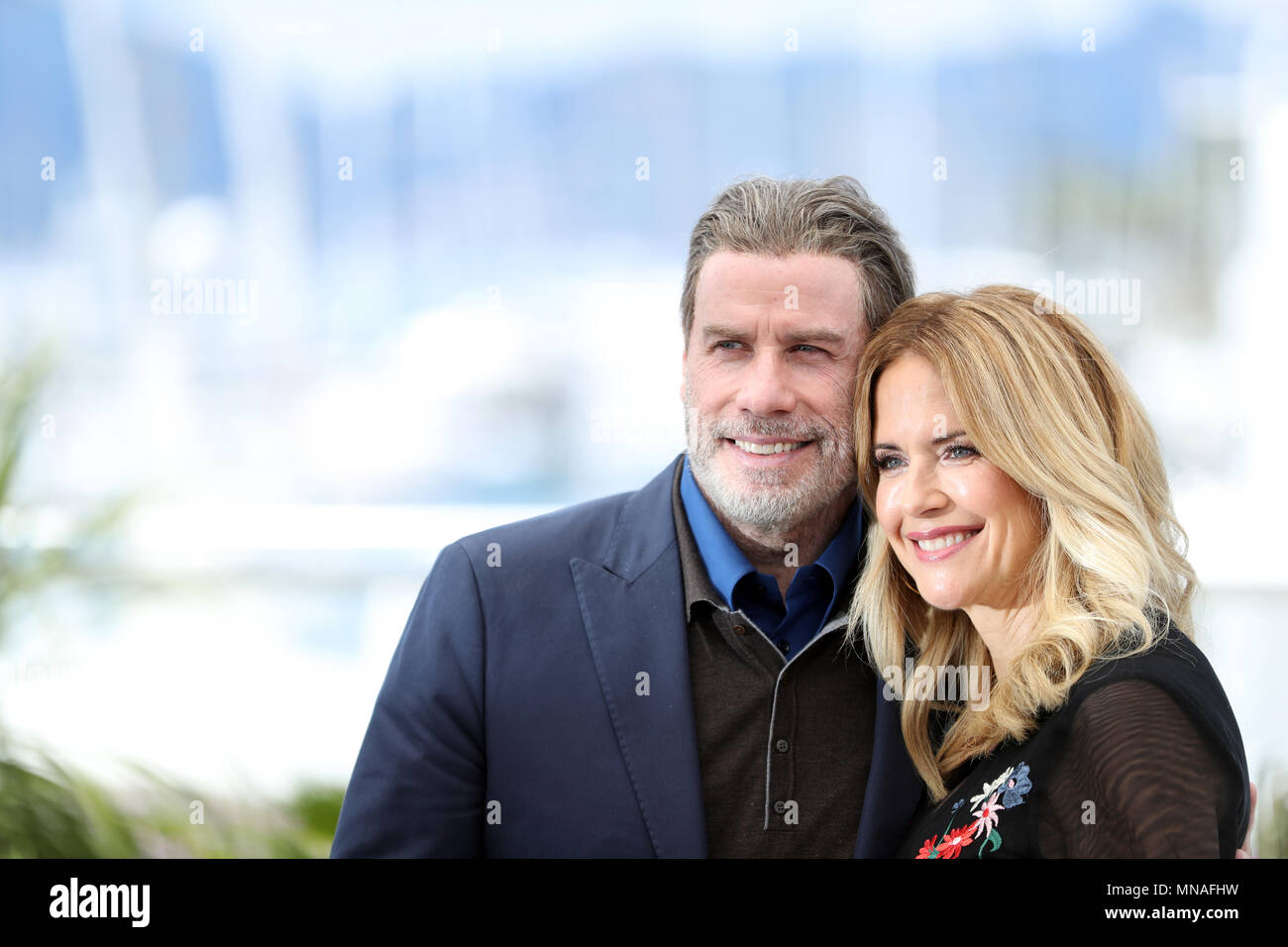 Cannes, France. 15th May, 2018. Actor John Travolta and his wife Kelly Preston pose during a photocall for the film 'Gotti' at the 71st Cannes International Film Festival in Cannes, France, on May 15, 2018. The 71st Cannes International Film Festival is held from May 8 to May 19. Credit: Luo Huanhuan/Xinhua/Alamy Live News Stock Photo