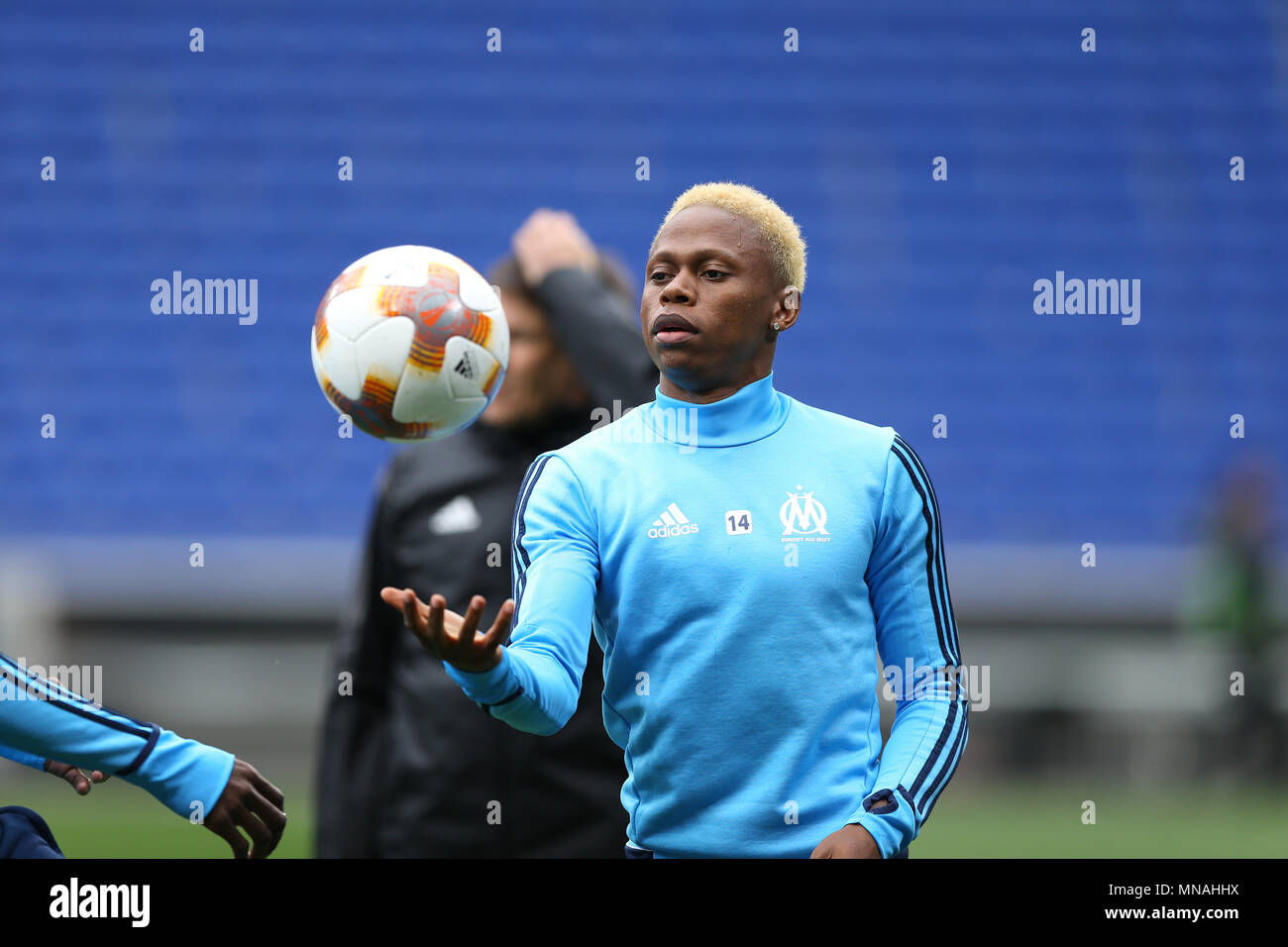 Groupama Stadium. 15th May, 2018. Lyon, France; Europa League Final training, Atletico Madrid versus Marseille; Olympique de Marseille train; Clinton Njie looks closely at the ball during practise Credit: Action Plus Sports/Alamy Live News Stock Photo