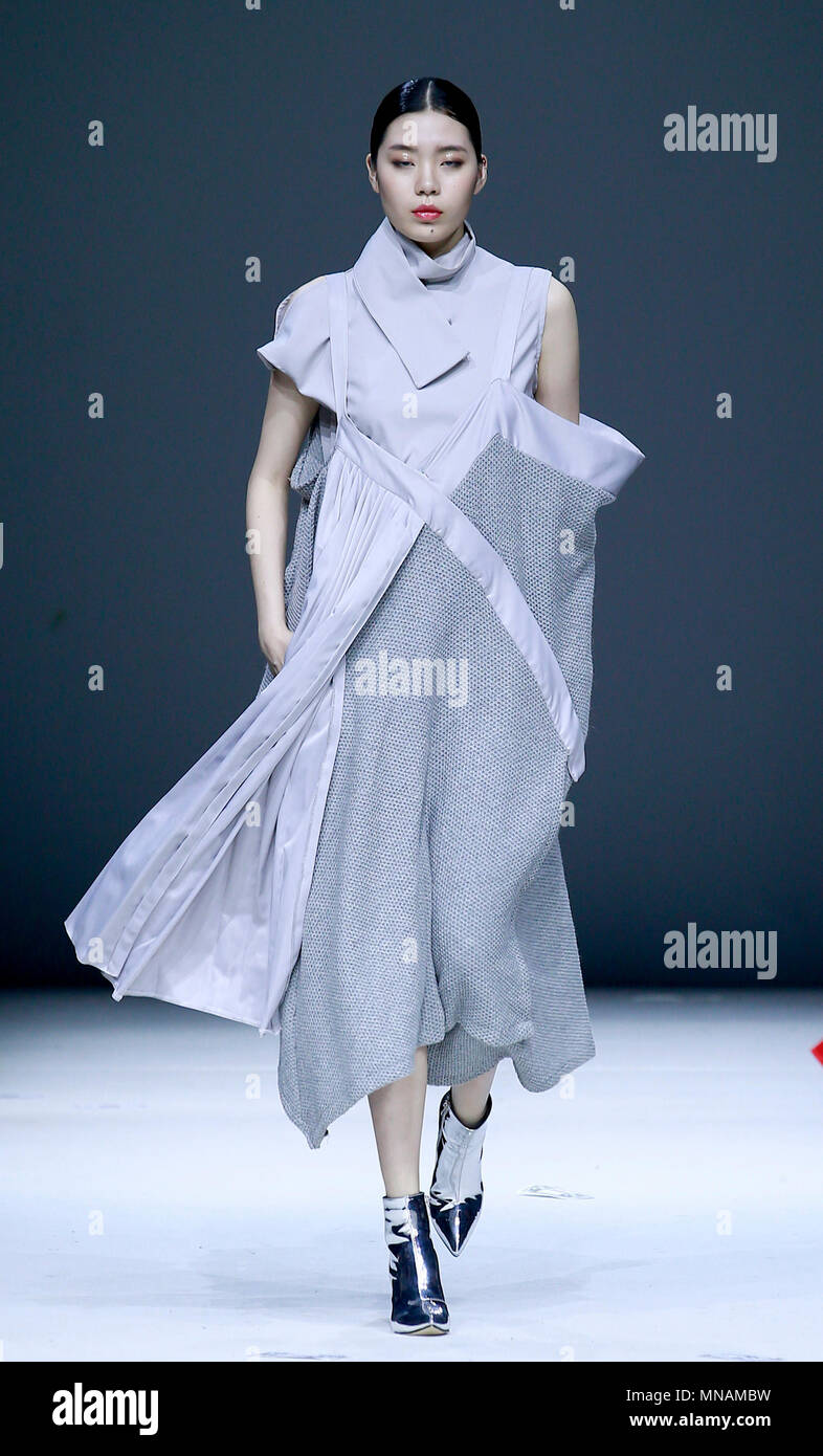 Beijing, China. 16th May, 2018. A model presents a creation designed by ...