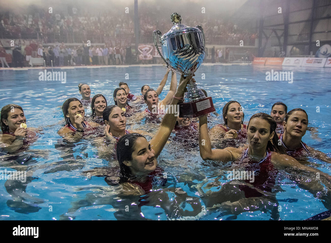Piraeus, Greece. 15th May, 2018. Olympiacos' players celebrate with the  championship trophy during the water polo final match of Greek championship  between Olympiacos and Vouliagmeni at the Papastratio swimming pool arena in