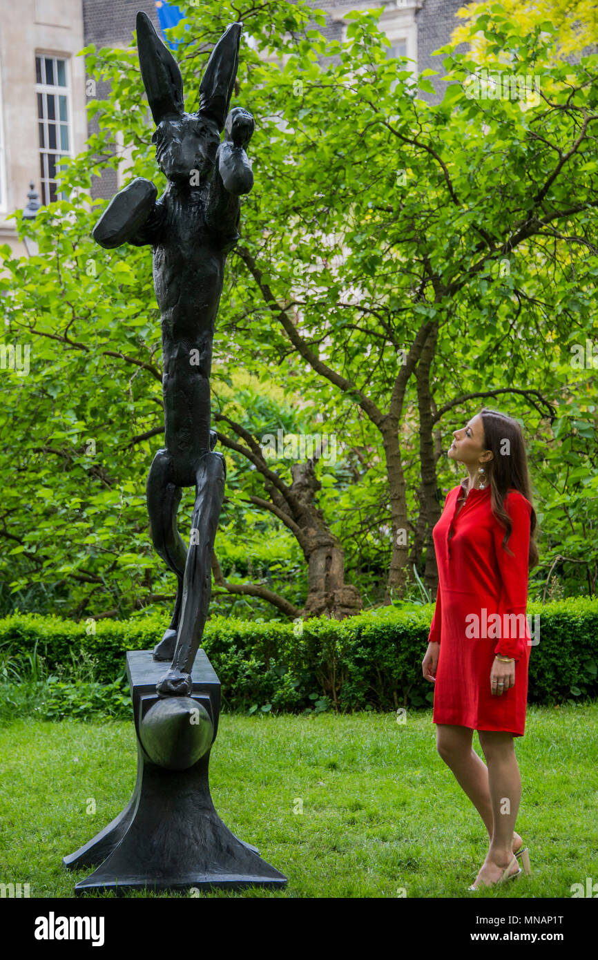 London, UK. 16th May 2018. Barry Flanagan, Boxing Hare on Anvil, 1989, estimate: £500,000-700,000 - Christie’s will present ‘Sculpture in the Square’ an outdoor sculpture garden set within St James’s Square, London, on view to the public from 17 May to 20 June 2018. Credit: Guy Bell/Alamy Live News Stock Photo