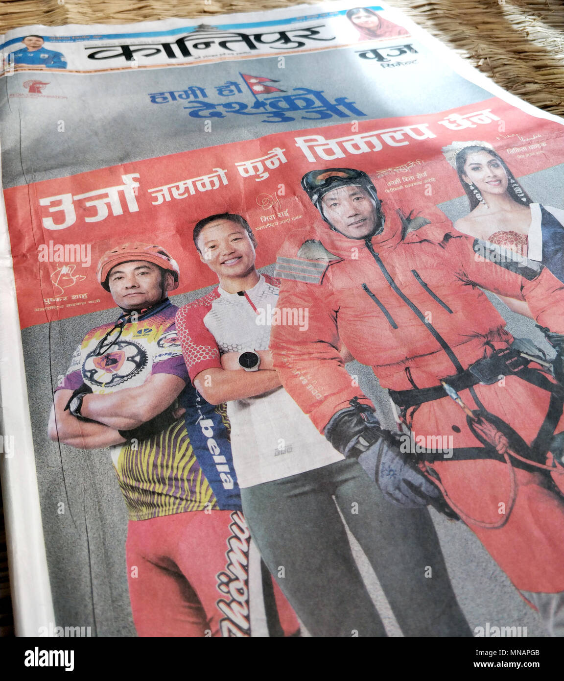 Undated, Nepal, Kathmandu: An issue of the Kantipur newspaper of the 01 April 2017 with the photo of Kami Rita Sherpa (2-R), who appears in the advertisment of a cement company. Photo: Deepak Adhikari/-/dpa Stock Photo