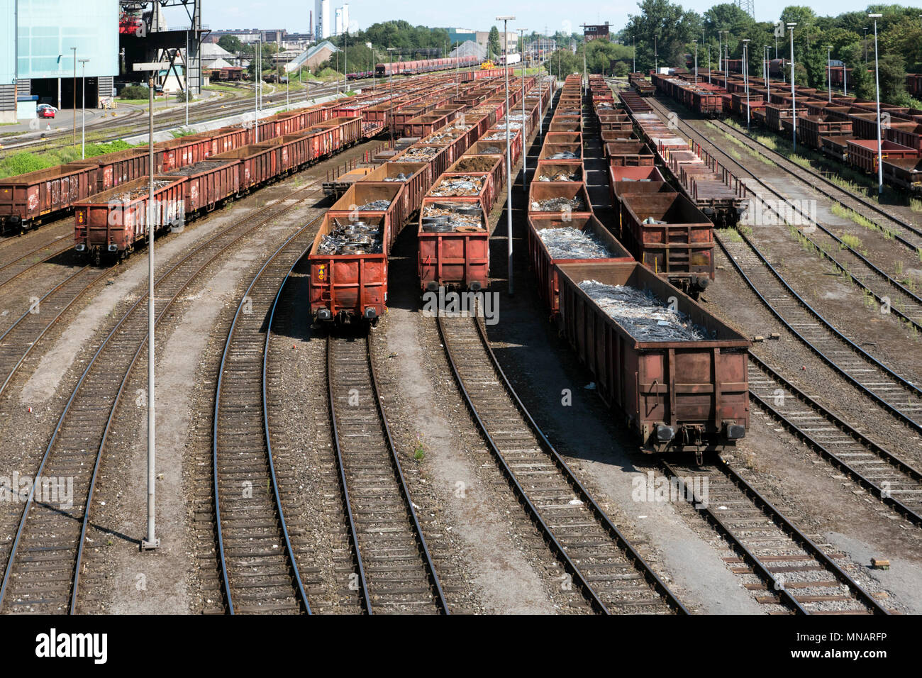 Freight cars loaded with steel scrap Stock Photo