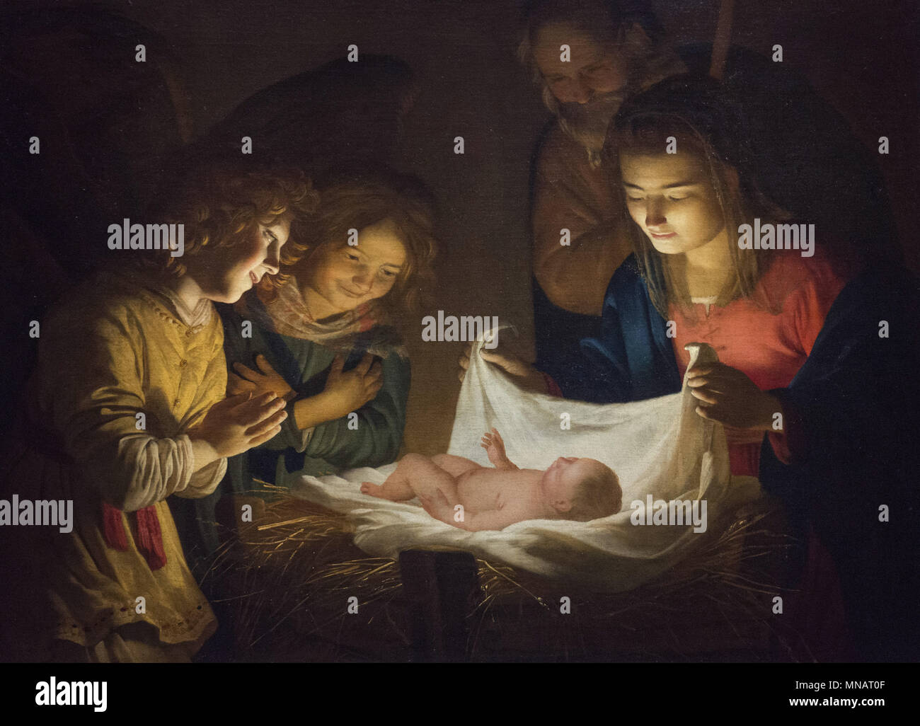 GHERARDO DELLE NOTTI - Adoration of the Child - c. 1619 - Uffizi Gallery - Galleria degli Uffizi Stock Photo