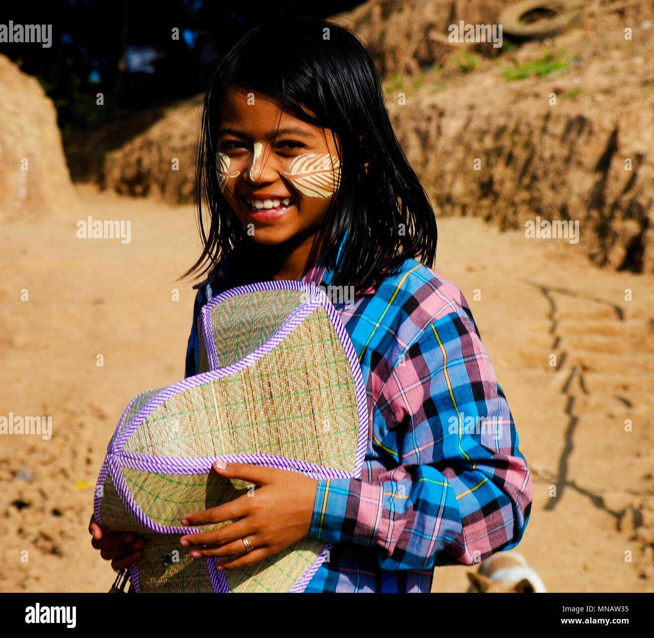 Portrait of Myanmar girl with thanaka - 03-01-2013 Mandalay, Myanmar Stock Photo