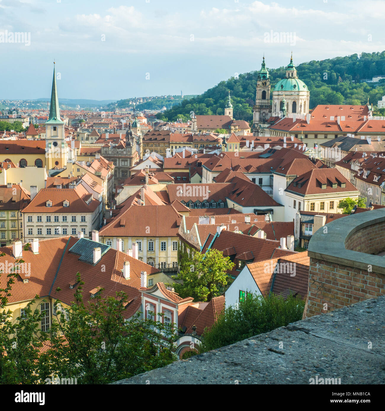 View from the castle complex over Prague with the St Nicholas Bell Tower on the right, Czech Republic Stock Photo