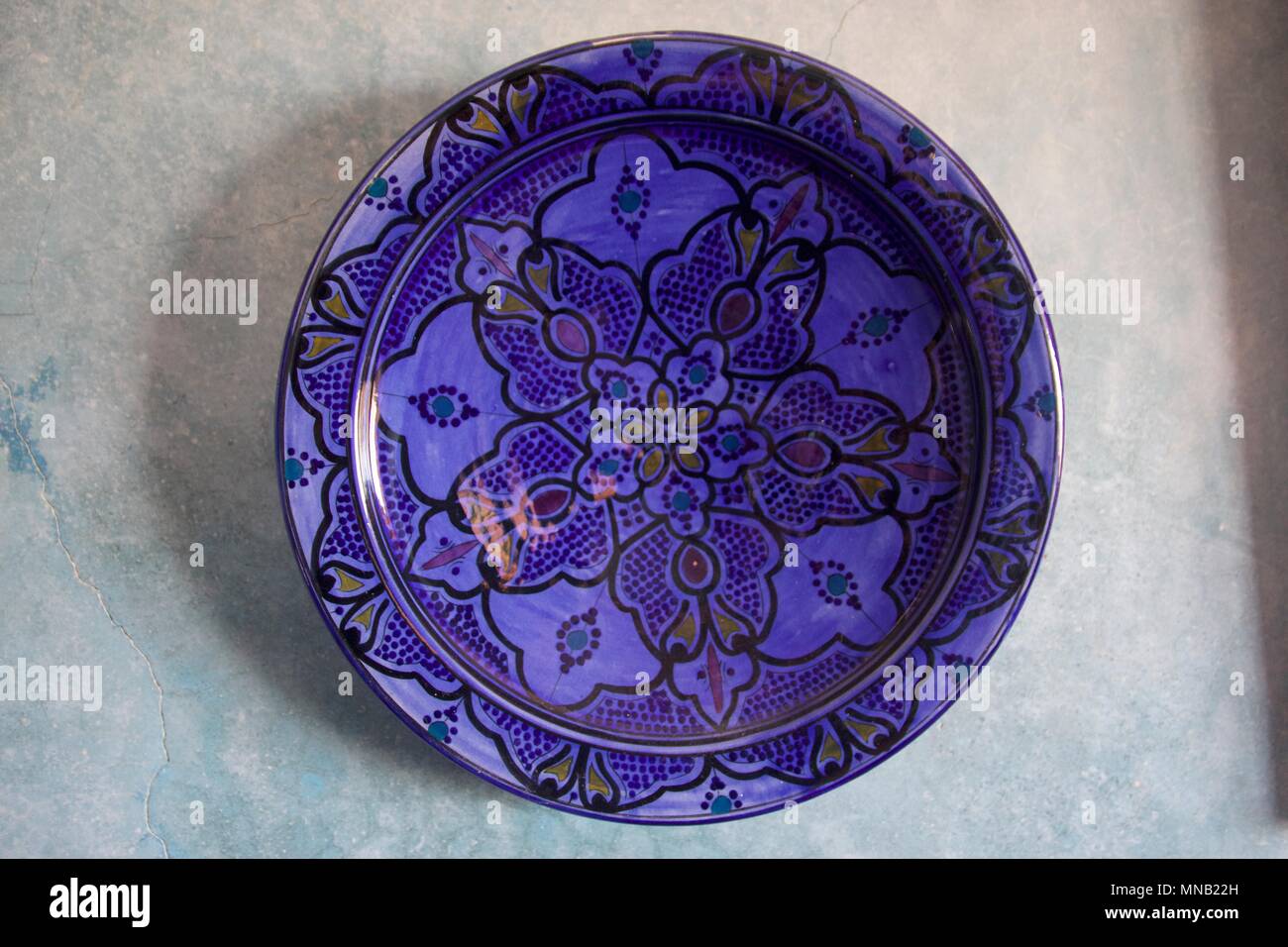 Purple Decorative Plate Hanging On A Wall In A Home In Essaouira