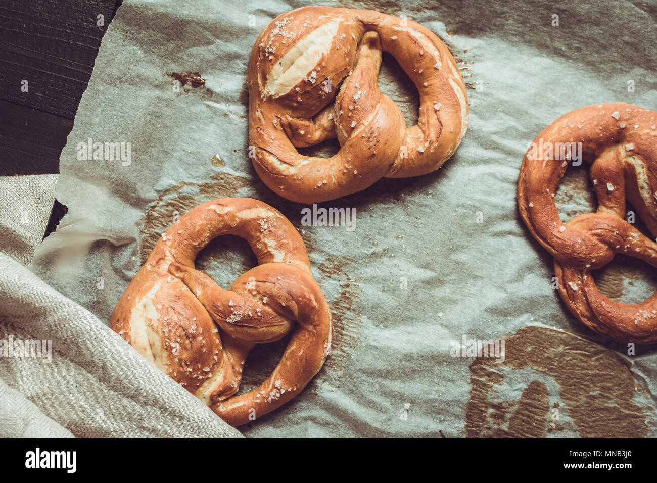 Pretzels From the Oven on Baking Sheet. Rustic Look. Stock Photo
