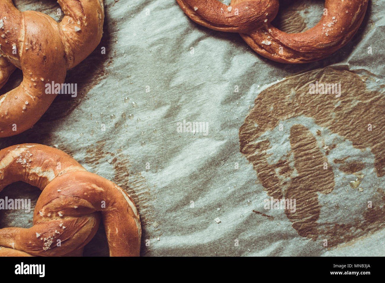 Pretzels From the Oven on Baking Sheet. Rustic Look. Stock Photo