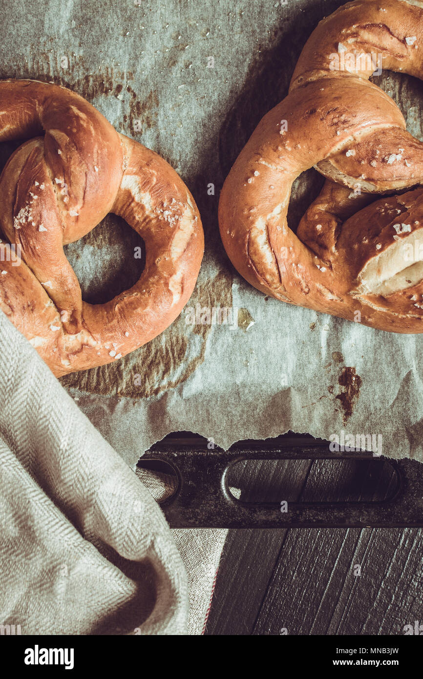 Pretzels From the Oven on Baking Sheet. Rustic Look. Stock Photo
