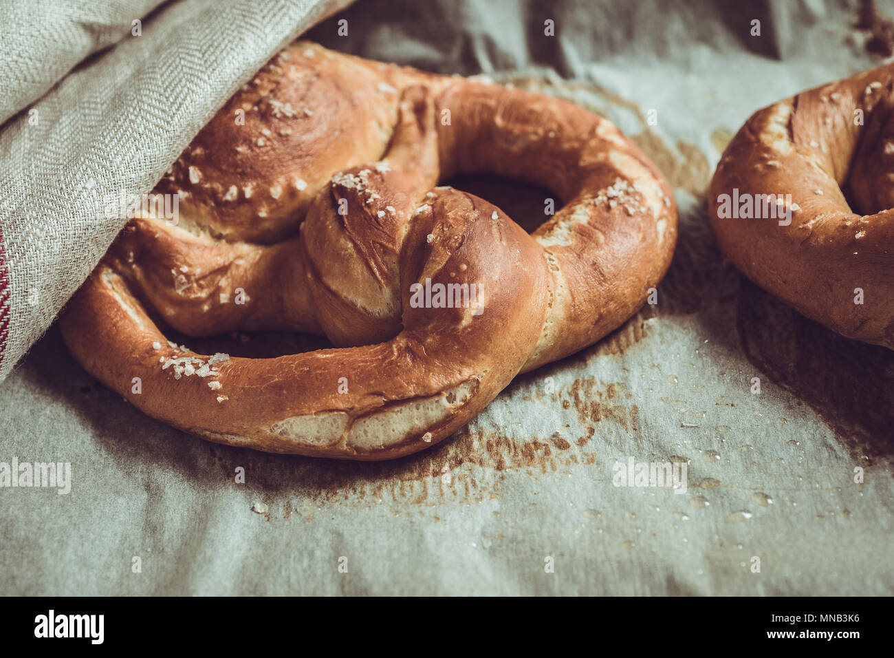 Pretzels From the Oven on Baking Sheet. Rustic Look. Stock Photo