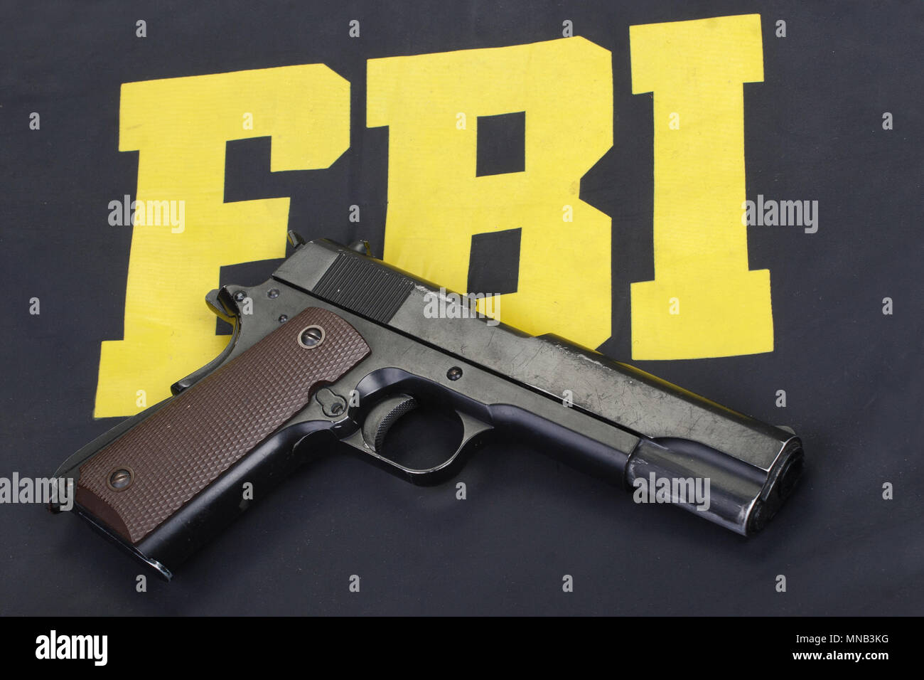 colt government m1911 handgun on fbi uniform Stock Photo