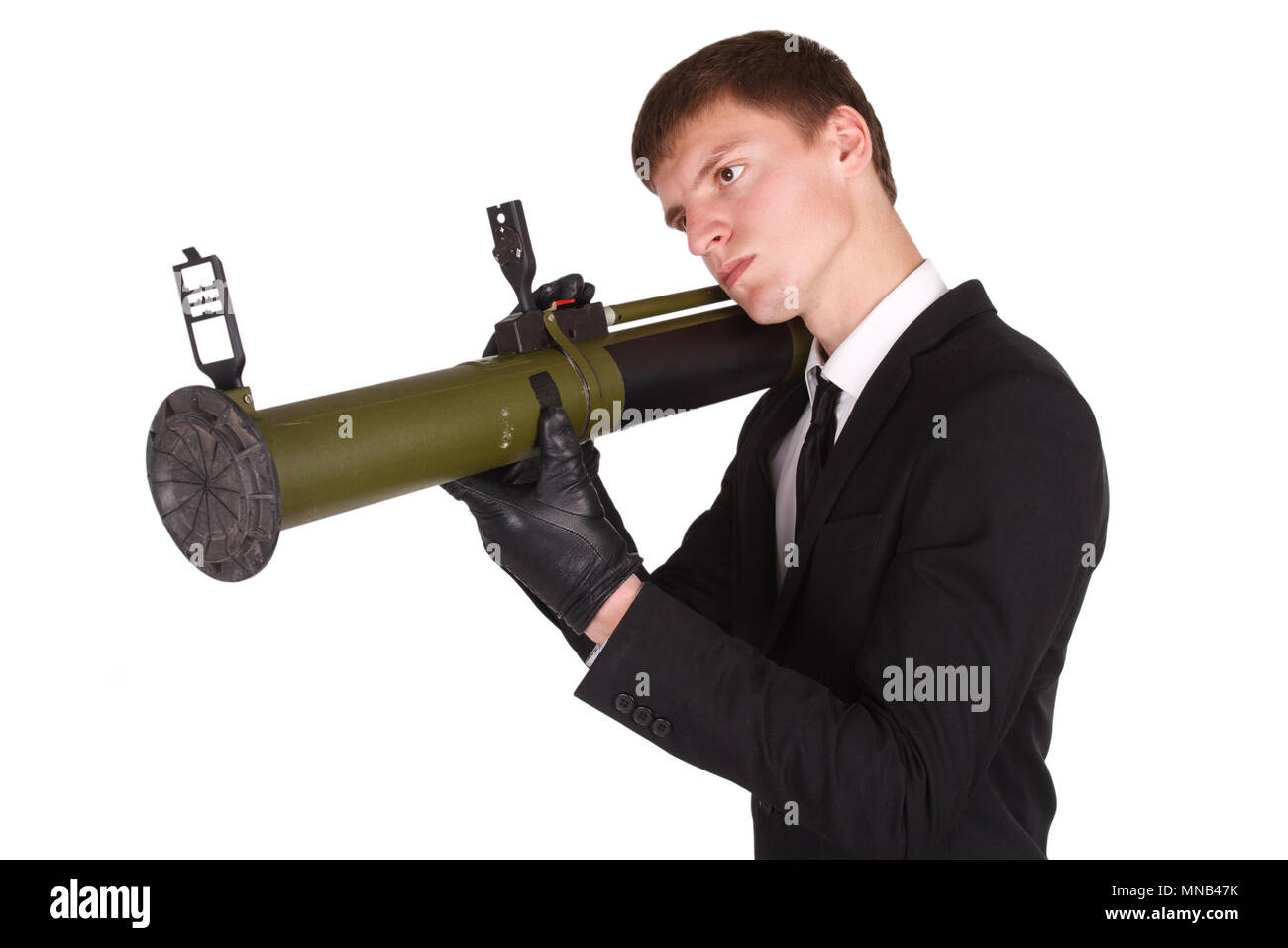 man in black costume and bazooka isolated on white Stock Photo - Alamy