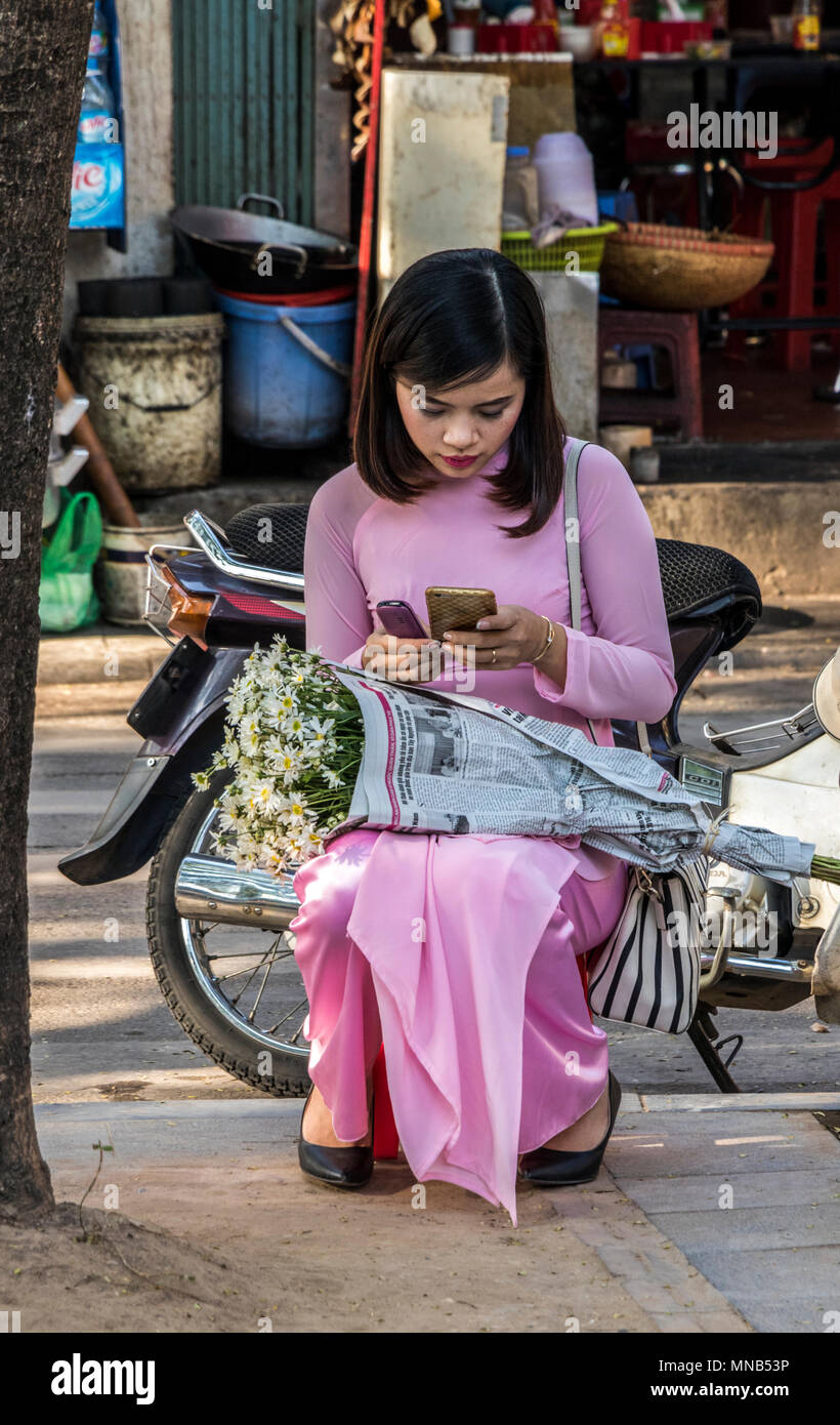 Girls In Traditional Vietnamese Ao Dia On Streets Of Hanoi Vietnam 