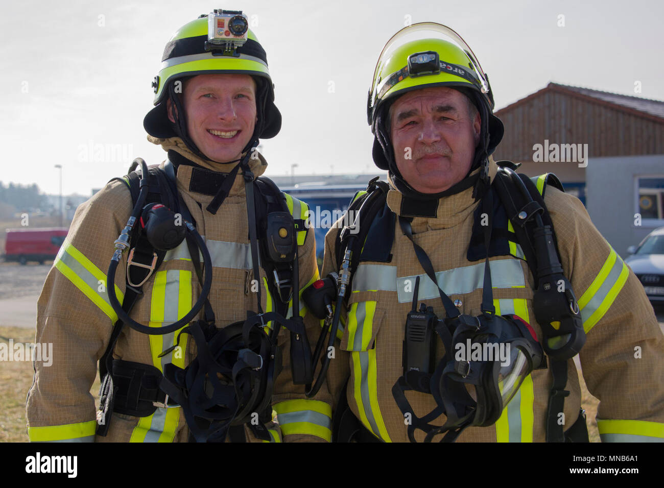 ANSBACH, Germany -- U.S. Firefighters from Ansbach and Grafenwoehr Fire Departments conduct joint live fire training at the Urlas fire emergency training facility March 15, 2018.  Two of the Fire Fighters Rudolf and Patrick Dobmann pictured are father and son; Rudolf Dobmann has worked for 33 years for the Grafenwoehr Fire Department. His son, Patrick has worked there since 2015. (U.S. Army Stock Photo