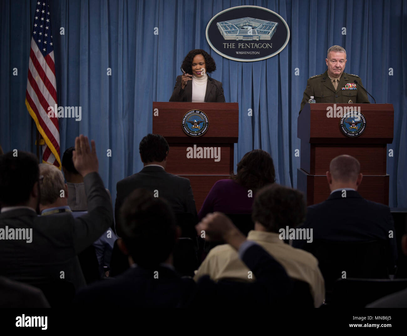 Dana White, the assistant to the secretary of defense for public affairs, and Lt. Gen. Kenneth F. McKenzie, the Joint Staff director, brief the press at the Pentagon in Washington, D.C., March 15, 2018. (DoD Stock Photo
