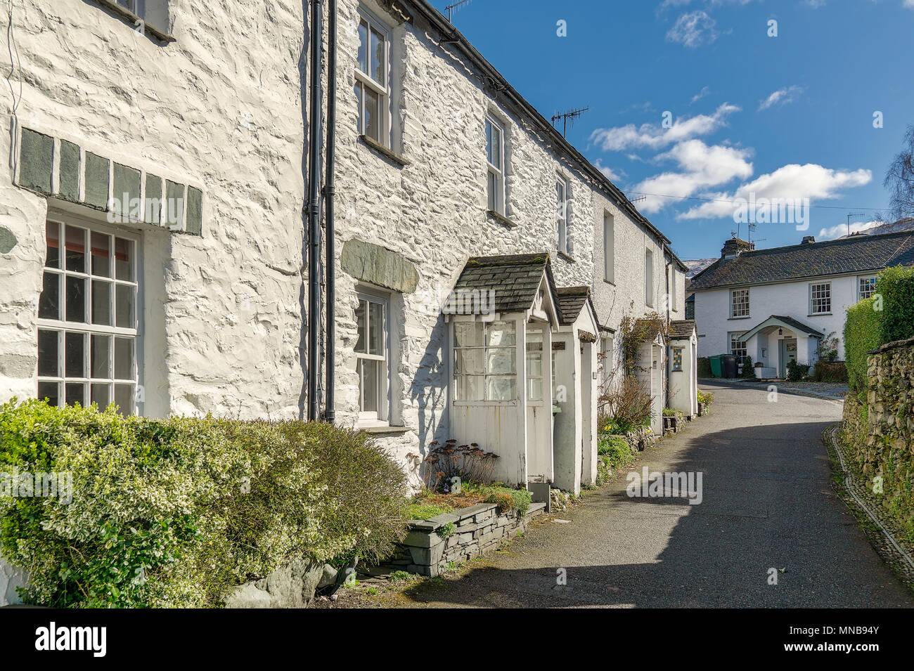 A row of whitewashed cottages in Ambleside, the English Lake Dis Stock Photo