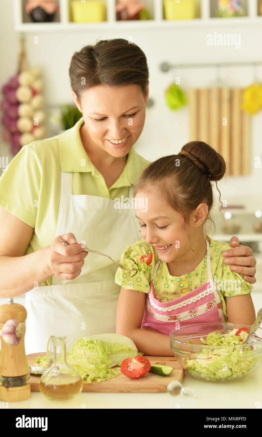 mom teaches daughter to cook Stock Photo Alamy