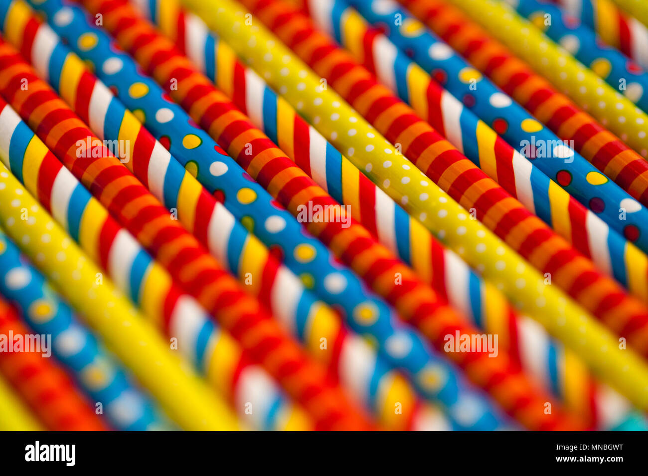 Close-up of multicolored pencils with design elements in rows Stock Photo