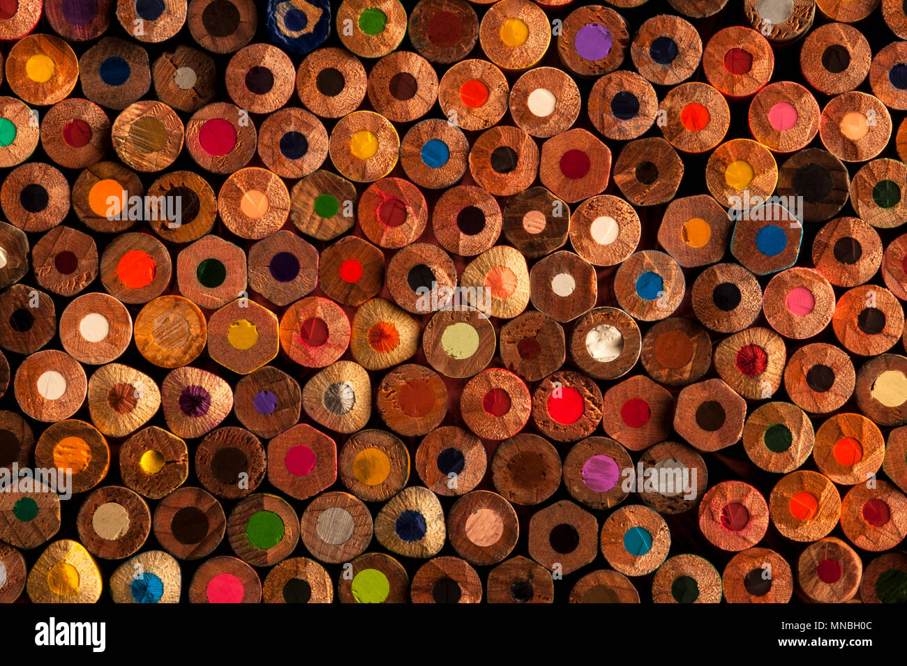 Close-up of multicolored pencils with design elements in rows Stock Photo