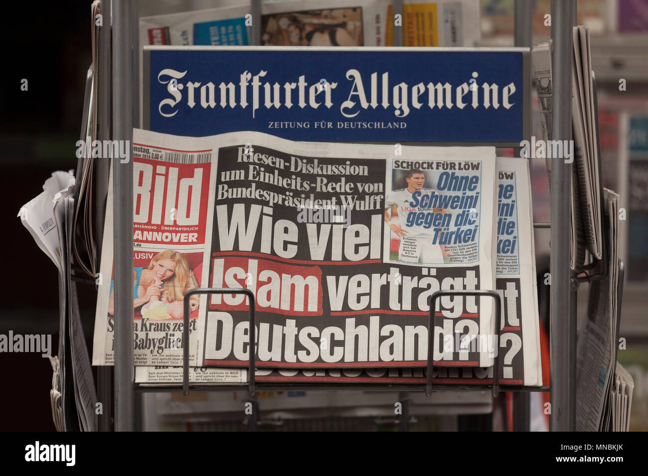 BILD newspaper of October 2010 on a rack with headline "How much islam can  Germany cope with Stock Photo - Alamy