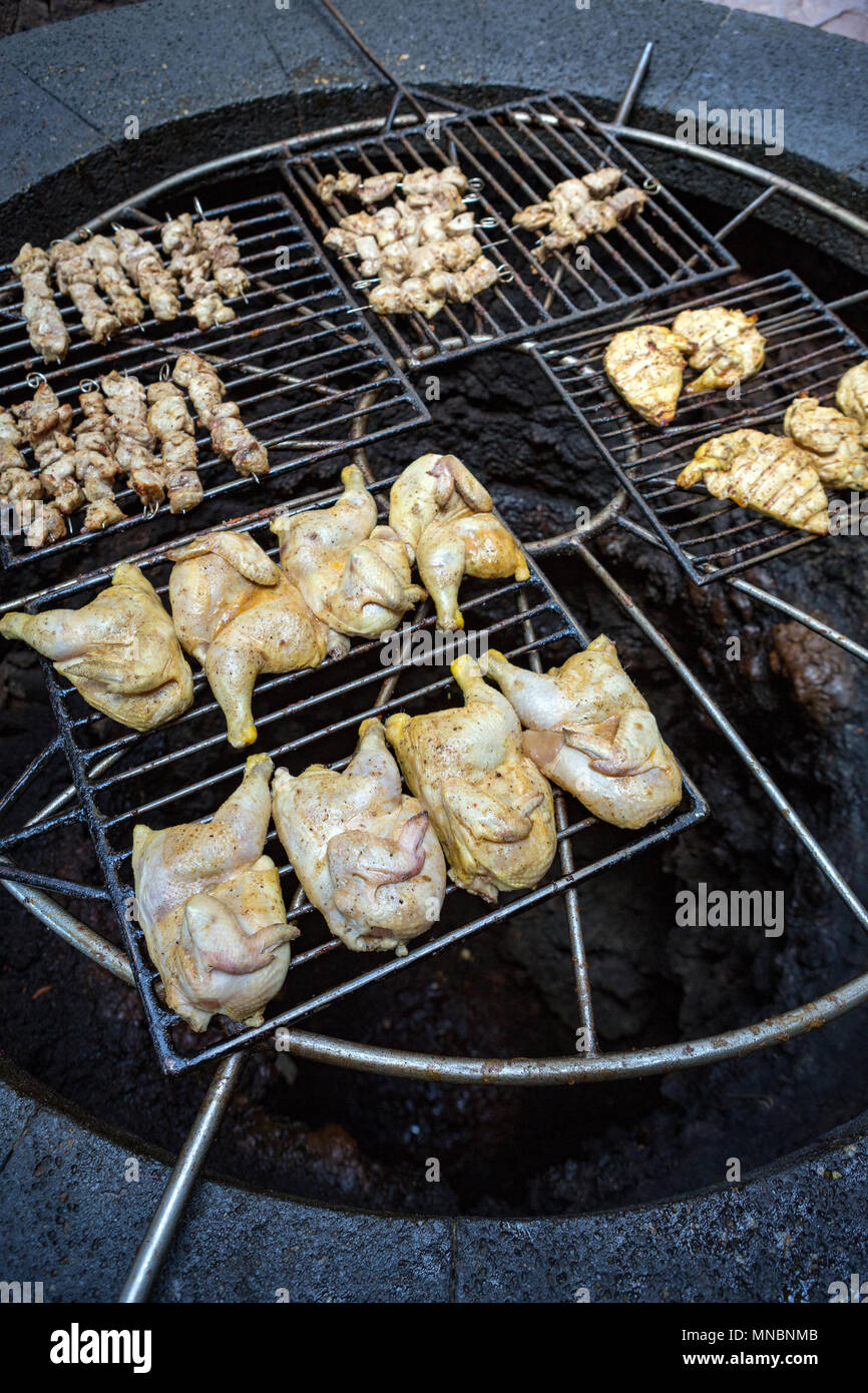 LANZAROTE, CANARY ISLANDS, SPAIN: El Diablo Restaurant grilling chicken on geothermal heat from the earth ion the fire mountain. Stock Photo