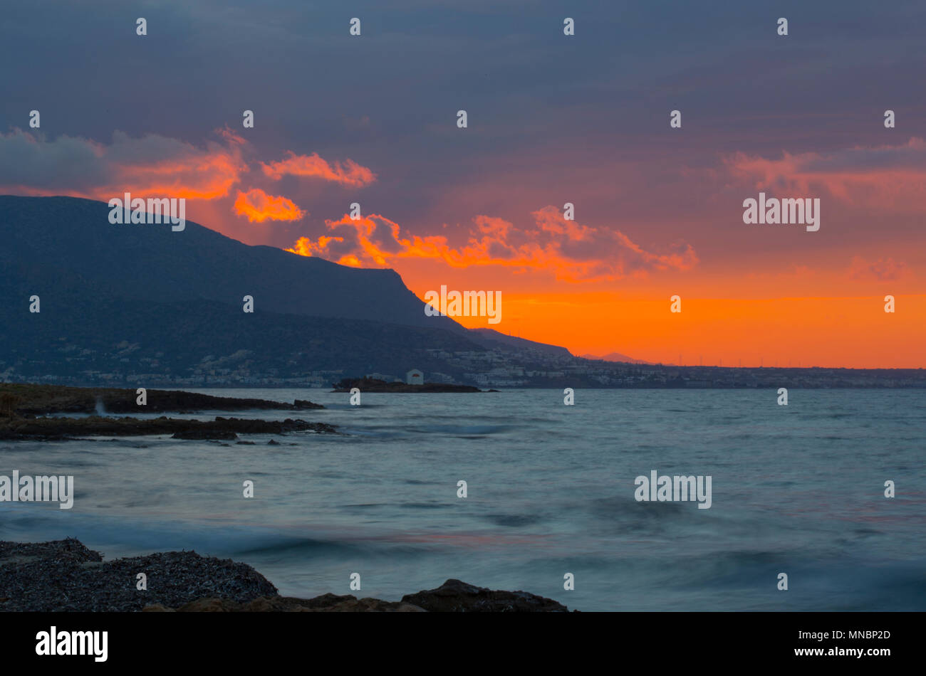 View of Afentis Christos island near to Malia Stock Photo