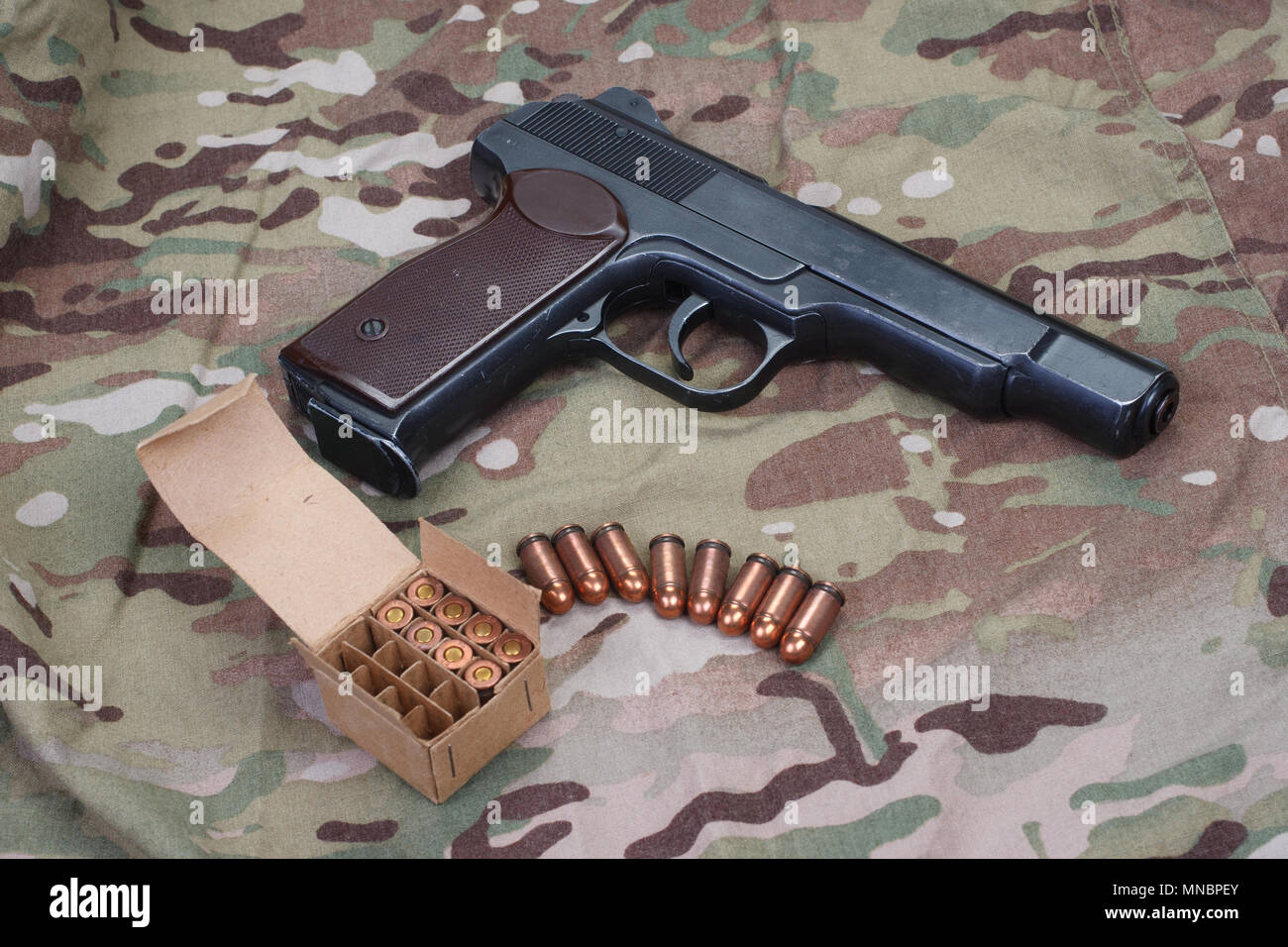 Stechkin automatic pistol APS on camouflage background Stock Photo - Alamy