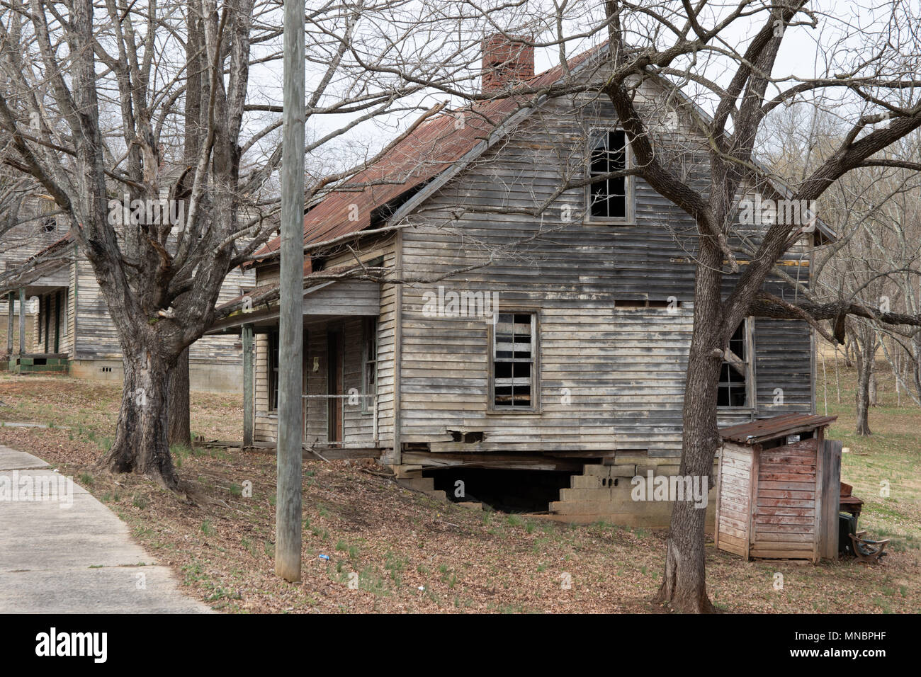 An abandoned house in a defunct Henry River mill village, in Burke