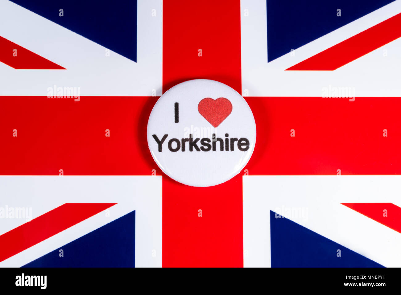 LONDON, UK - APRIL 27TH 2018: An I Love Yorkshire badge pictured over the UK flag, on 27th April 2018. Stock Photo