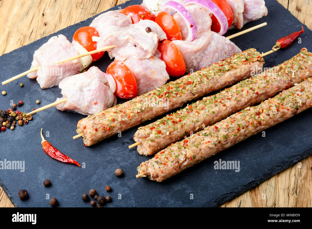 Kebab, threaded on skewers pieces of meat Stock Photo - Alamy