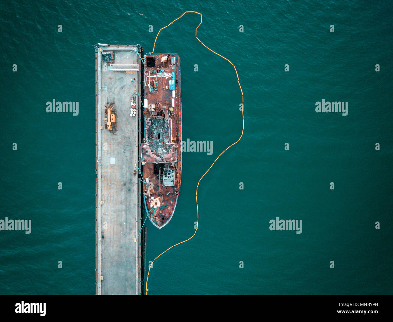 Aerial photo of a docked boat under repair Stock Photo