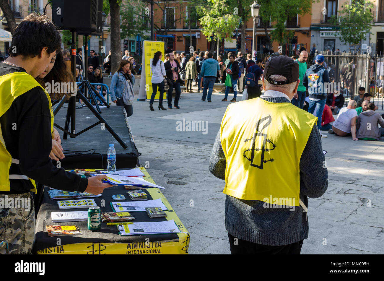 Young People In Dos De Mayo Square With A Stand Of Amnistia Internacional Malasana Quarter Madrid City Spain Stock Photo Alamy