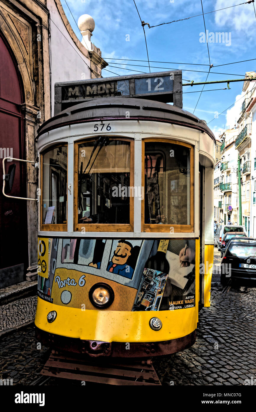 Tram nnumber 12 on its circular route to Martim Moniz, through Graca, Baixa and the old town of Alfama Stock Photo