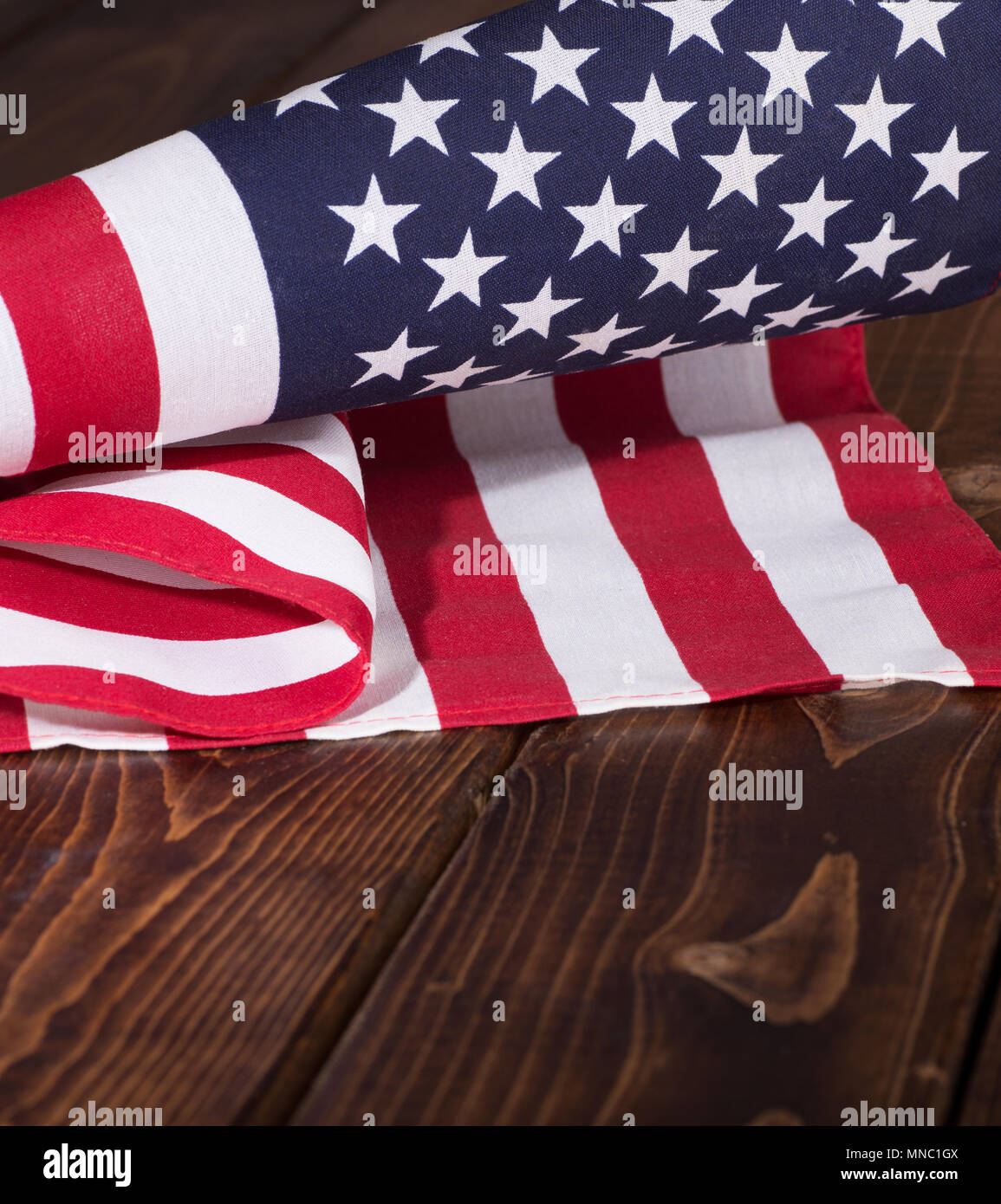 United States flag on a rustic wooden background with copy space ...