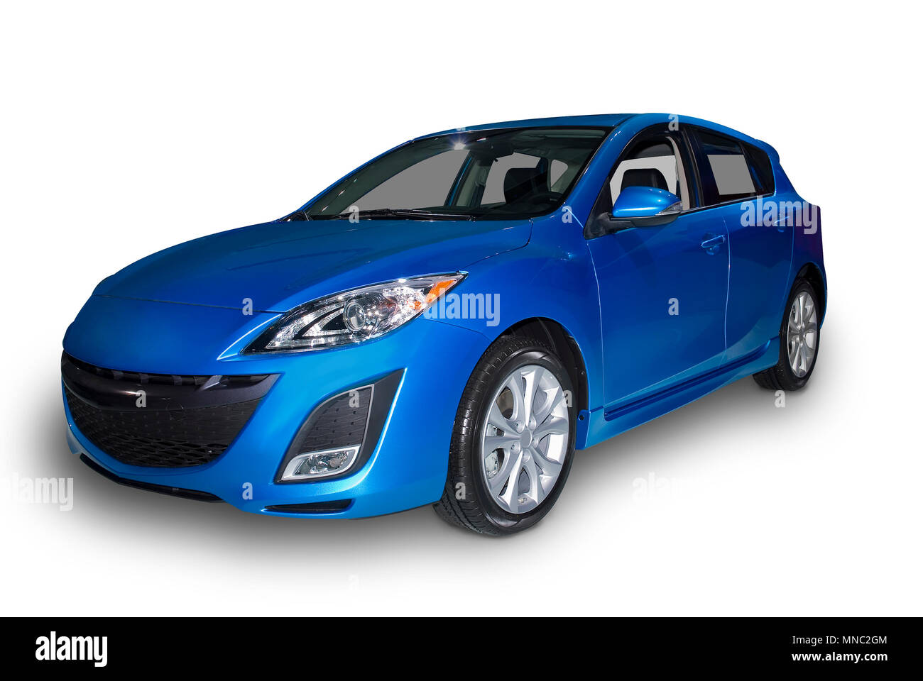 Bright blue four door compact hybrid car isolated on a white background. A  realistic shadow under the car is included Stock Photo - Alamy
