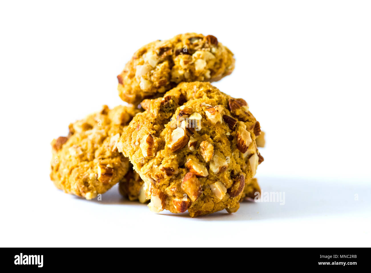 Homemade almond cookies against white background isolated Stock Photo