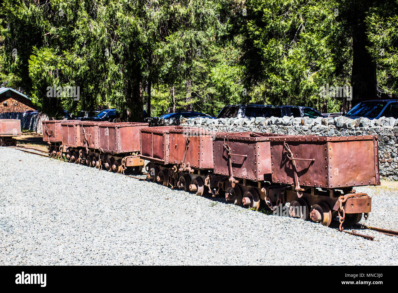 Eight Vintage Mining Ore Carts In Row Stock Photo - Alamy