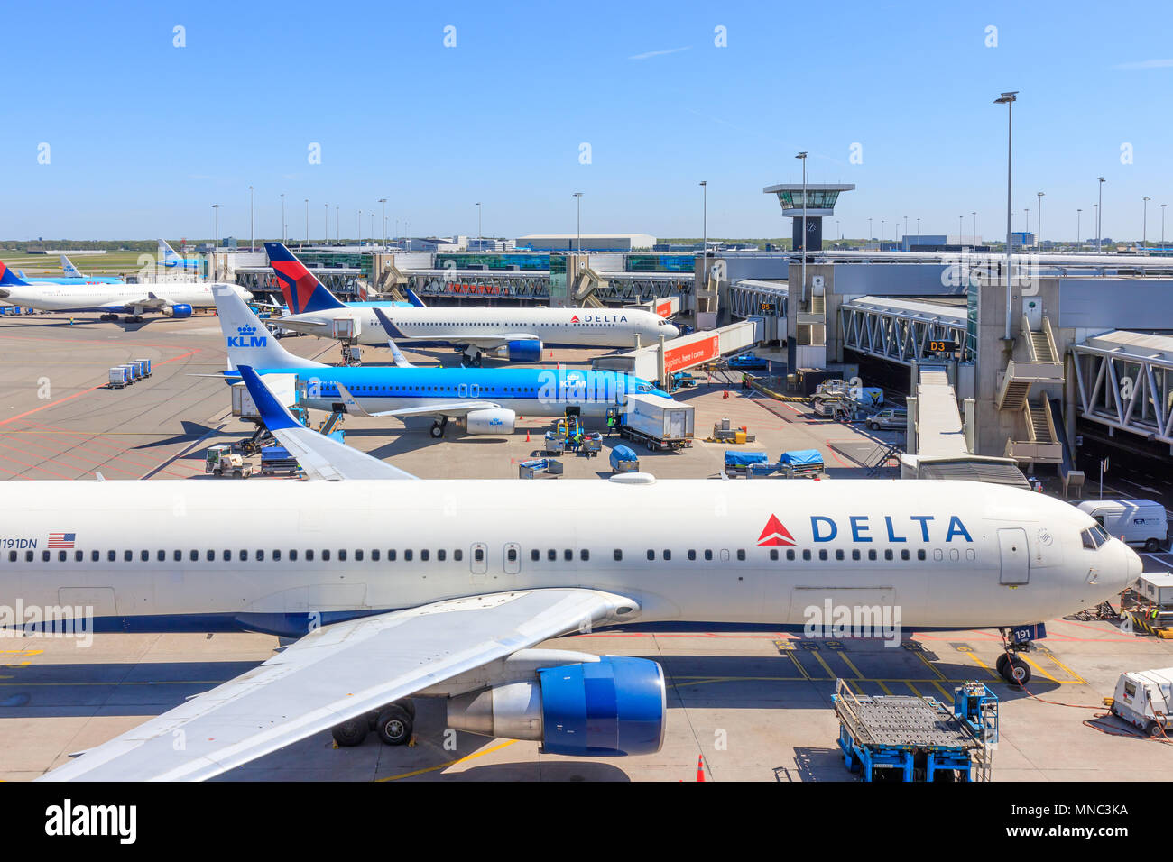 Amsterdam, Netherlands - May 04, 2018: Parked Planes at Schiphol Airport Stock Photo