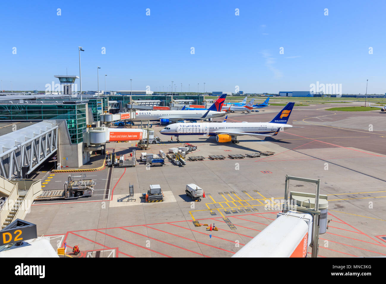 Amsterdam, Netherlands - May 04, 2018: Parked Planes at Schiphol Airport Stock Photo